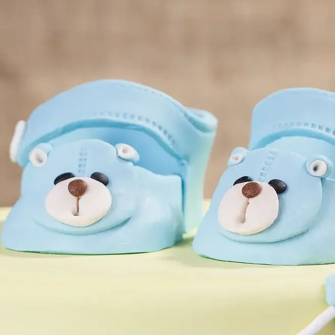 Blue Baby Shoes Truffle Cake  Delice 1 Kg 
