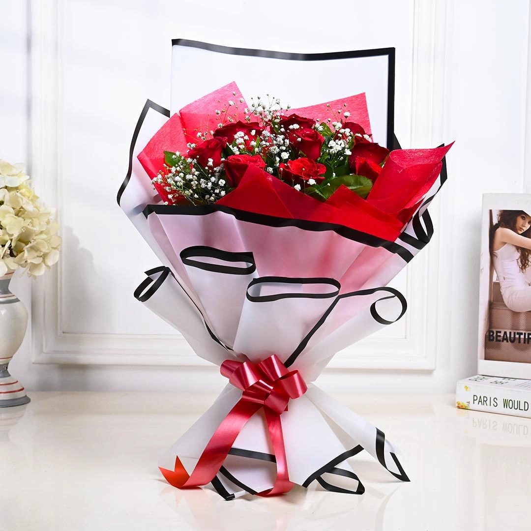 Red Roses Wrapped In Elagance Bouquet