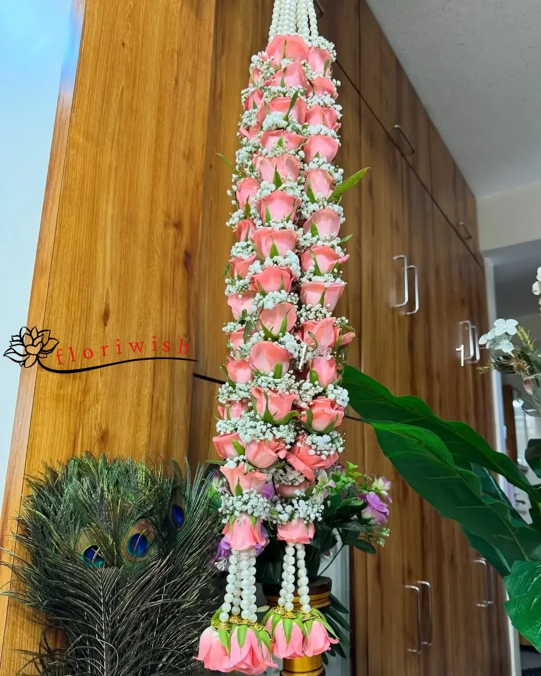 Baby pink roses with baby's breath Jaimala
